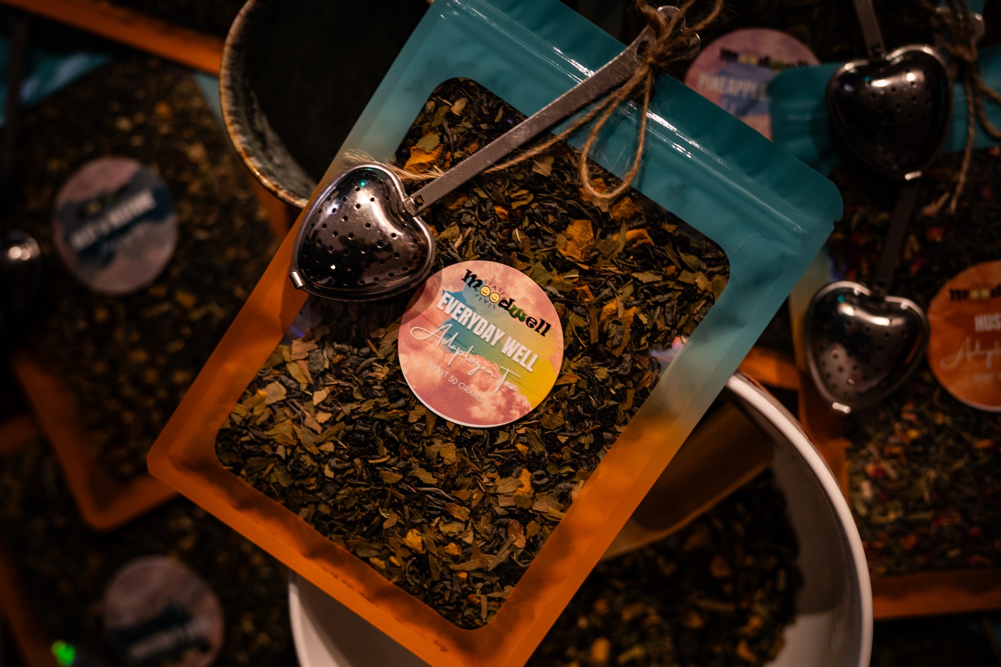 Everyday Wellness Tea in it's practical resealable packaging is made for everyday wellness on the go. The looseleaf hand mixed tea blend is made from elderberry, turmeric, gingko biloba, and green tea to enhance your day. ,